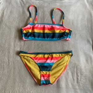 Brightly colored striped bikini.